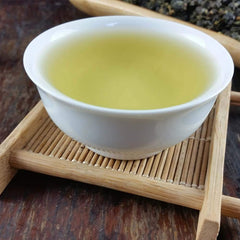 FullChea tea leaves unfurling in a gaiwan to demonstrate multiple fragrant infusions