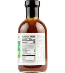 Sauce pouring texture close-up from Gabrick Barbecue demonstrating glossy viscosity for perfect glazing benefit