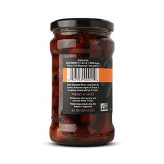 Gaea open jar on charcuterie board showing pitted olives for easy serving