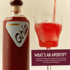 Pouring Ghia concentrate into a glass demonstrating texture and vibrant color