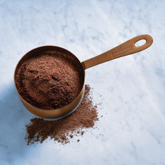 Ghirardelli double chocolate frappe poured in glass with garnish, showcases visual appeal