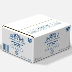 Ghirardelli white mocha in ceramic cup with steam, showcasing creamy café-quality beverage