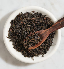 Ghograjan Tea Estate brewed cup with rich color illustrating strong full-bodied taste