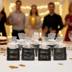 Gift Boutique mints being added to a favor bag for coordinated birthday party favors