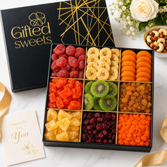 Gifted Sweets open box overhead view with nine assorted dried fruits neatly arranged for gifting