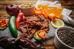 Close-up of Glenwood Snacks beef jerky texture highlighting thick, wood-smoked meat pieces for hearty chew