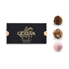 Godiva open box displaying the eight assorted truffles for easy selection