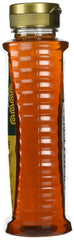 Golden Blossom honey pour close-up showing smooth texture and easy mixing