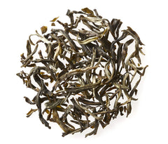 Golden Moon jasmine flowers layered with tea illustrating natural scenting process