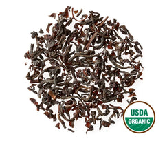 Golden Moon Tea loose leaves close-up showing rich texture and aroma