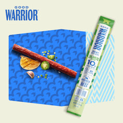 Good Warrior jalapeño beef stick held in hand for portion context