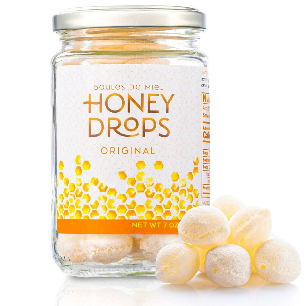 Gourmanity jar front packaging showcasing elegant honey drop gift presentation
