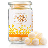 Gourmanity jar front packaging showcasing elegant honey drop gift presentation