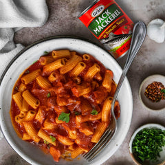 Grace mackerel open can with tomato sauce highlighting saucy texture