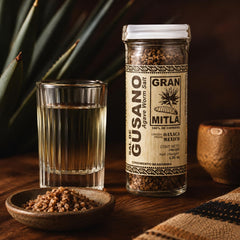 Gran Mitla salt rimmed on citrus slice adding bright cocktail flavor