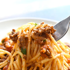 GranAroma oregano flakes in measuring spoon, aids portioning and recipe accuracy