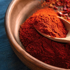 GranAroma powder stirred into salsa bowl adding smoky heat and color