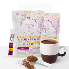 Grateful Earth brewed cup top view with crema, suggests rich medium-roast flavor