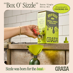 Graza Sizzle pour spout in use for controlled, drip-free pouring