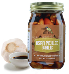 Green Jay Gourmet front jar view showing label and garlic cloves, convenient pantry staple