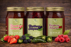 Green Jay Gourmet jam served on cheese board with crackers, adds sweet-spicy flavor contrast