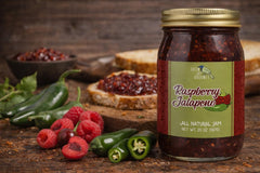 Green Jay Gourmet close-up jam texture showing raspberries and jalapeño pieces
