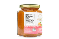Guava Gourmet jam on spoon ready to spread showing rich fruit concentration benefit