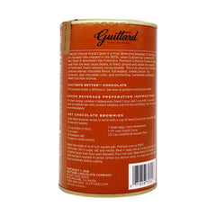 Steaming cup of Guittard Grand Cacao hot chocolate in kitchen scene, demonstrating indulgent warmth