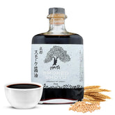 HAKU front bottle shot showing premium smoked shoyu and elegant presentation benefit