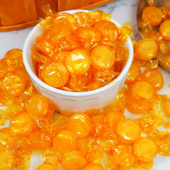 The Hampton Popcorn Company butterscotch candies in a clear candy jar for attractive display