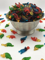 HARIBO bowl of dinosaur gummies in party setting adding playful colorful decoration