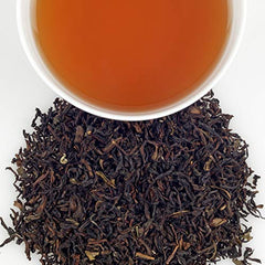 Harney & Sons loose leaf close-up revealing whole leaves and fruit-forward aroma benefit