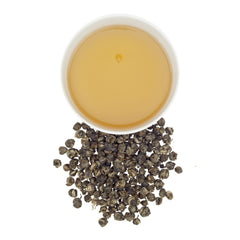 Harney & Sons close-up of jasmine-scented tea pearls highlighting hand-rolled texture