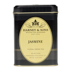 Harney & Sons loose pouchong leaves and jasmine flowers close-up showing texture
