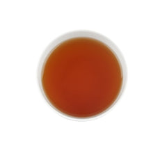 Harney & Sons iced glass in lifestyle setting showcasing refreshing mango flavor