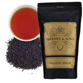 Harney & Sons front packaging of 16 oz organic Assam loose leaf tea, clear brand benefit fresh flavor