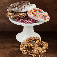 Hazel & Creme pretzel held in hand showing scale and convenient portion size