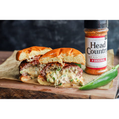 Head Country seasoning on sliced brisket enhancing color and flavor