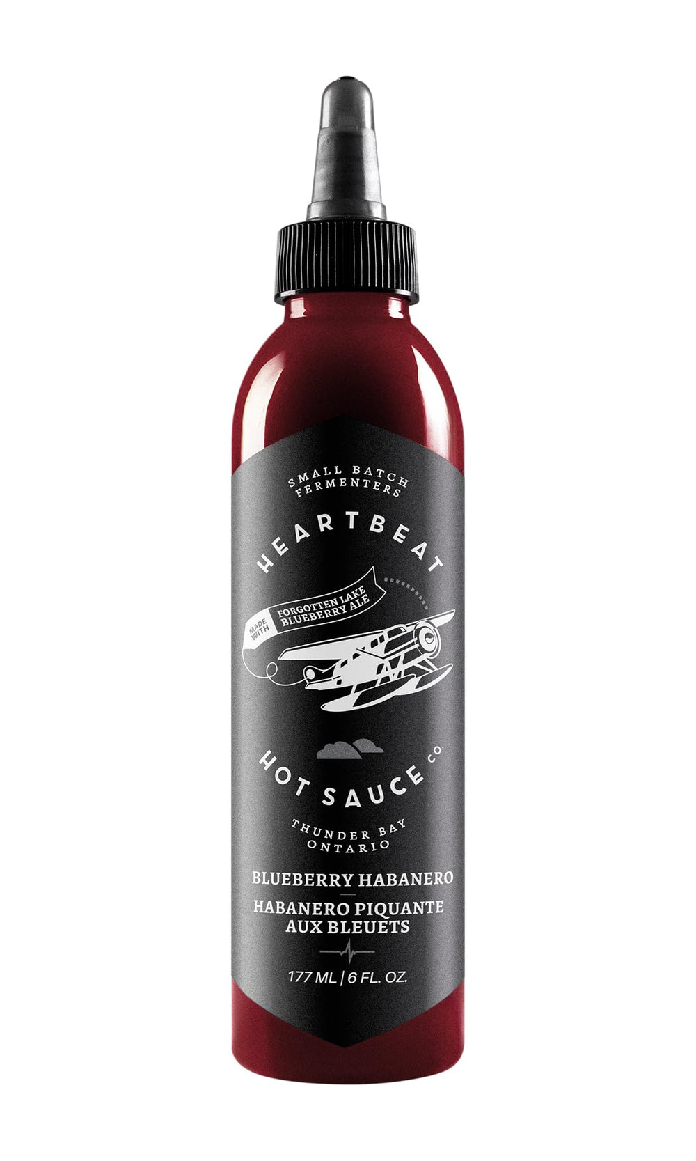 HEARTBEAT HOT SAUCE CO. front label showing blueberry habanero bottle and brand recognition