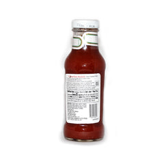 JFS Heinz being drizzled on a burger to add tangy flavor and visual appetite appeal