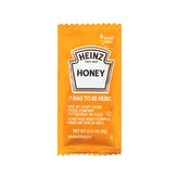 HEINZ honey front packet view showing branding and easy portioning benefit