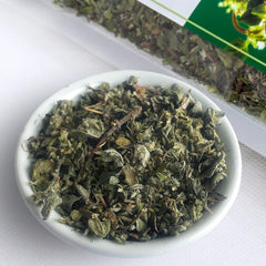 Close-up of HerbaZest muña loose leaves, showing texture and aroma