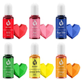 Herbeklab front packaging showing six oil-based color bottles and benefit vivid colors