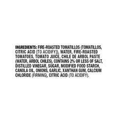 Herdez Roja sauce drizzle on taco illustrating smoky flavor boost and visual appeal