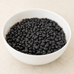 Close-up of dry black turtle beans texture highlighting High Plains Beans quality and consistency