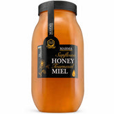HONIGMA front jar view showing clear label and generous 1000g size benefit