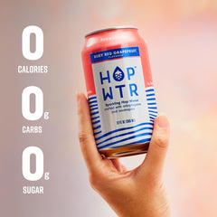 HOPWTR being poured into a glass offering crisp citrus refreshment