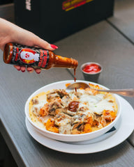 HOT ONES sauce texture close-up highlighting natural ingredients and viscosity