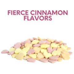 HOT TAMALES close-up of cinnamon conversation hearts revealing printed messages and spicy texture