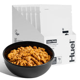 Huel Cajun Pasta front packaging showing brand and convenient meal benefits